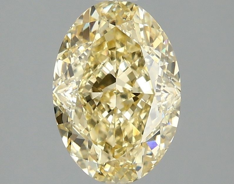 Loose Diamond - OVAL 2.09ct Fancy Intense Yellow VS1: Loose Diamond - OVAL 2.09ct Fancy Intense Yellow VS1 Source: This is a real non-mined Diamond that has been grown in a lab Shape: OVAL Carats: 2.09 Color: Fancy Intense Yellow Certification: IGI