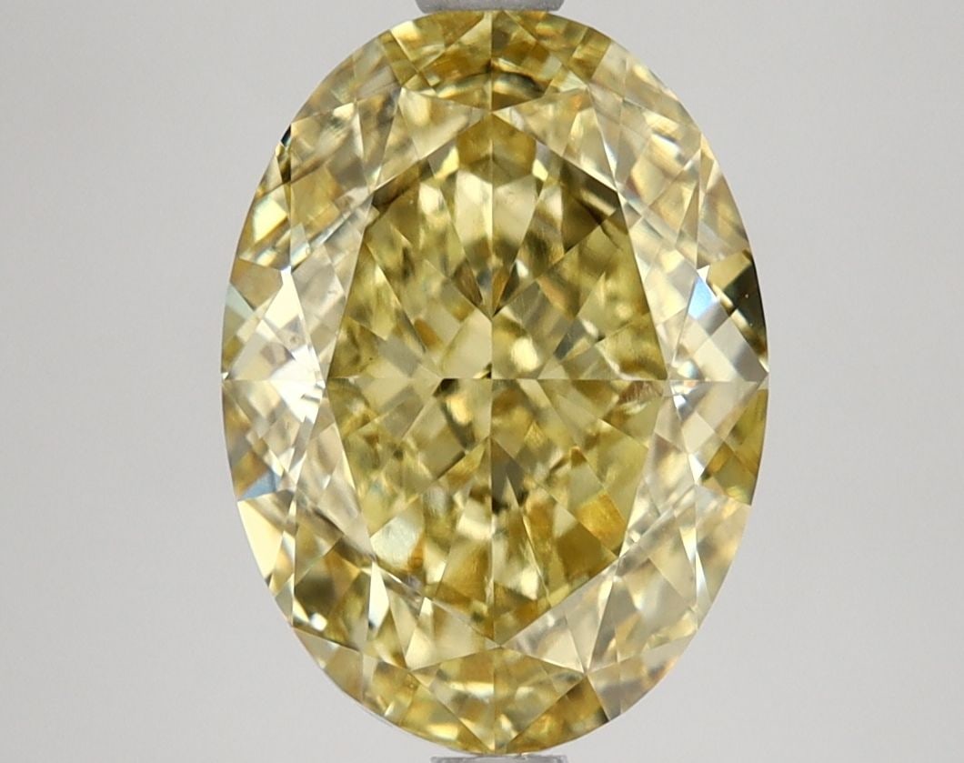 Loose Diamond - OVAL 4.13ct Fancy Vivid Yellow VS2: Loose Diamond - OVAL 4.13ct Fancy Vivid Yellow VS2 Source: This is a real non-mined Diamond that has been grown in a lab Shape: OVAL Carats: 4.13 Color: Fancy Vivid Yellow Certification: IGI Video:
