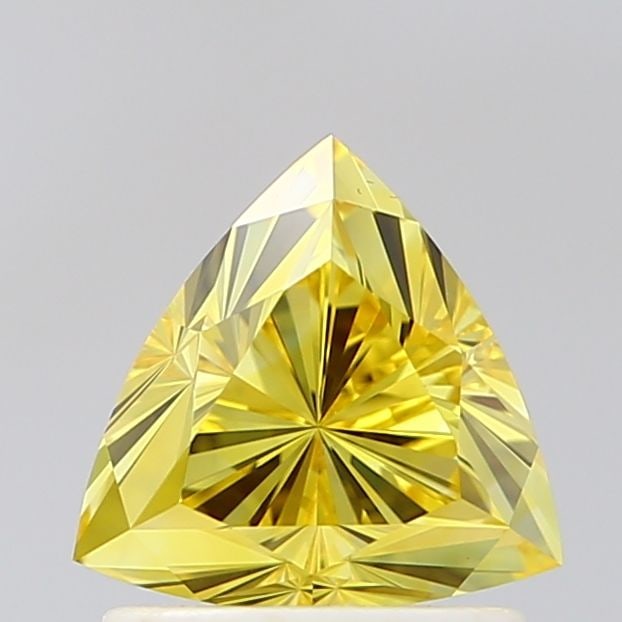 Loose Diamond - TRIANGULAR 1.07ct Fancy Vivid Yellow VS1: Loose Diamond - TRIANGULAR 1.07ct Fancy Vivid Yellow VS1 Source: This is a real non-mined Diamond that has been grown in a lab Shape: TRIANGULAR Carats: 1.07 Color: Fancy Vivid Yellow Certification: I