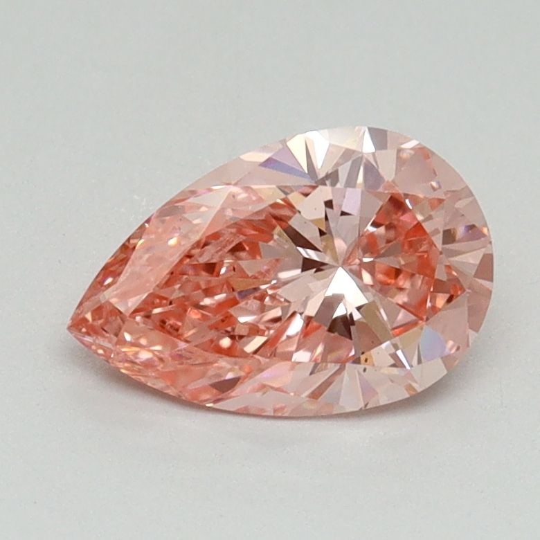 Loose Diamond - PEAR 0.94ct Fancy Vivid Pink VS2: Loose Diamond - PEAR 0.94ct Fancy Vivid Pink VS2 Source: This is a real non-mined Diamond that has been grown in a lab Shape: PEAR Carats: 0.94 Color: Fancy Vivid Pink Certification: IGI Video: