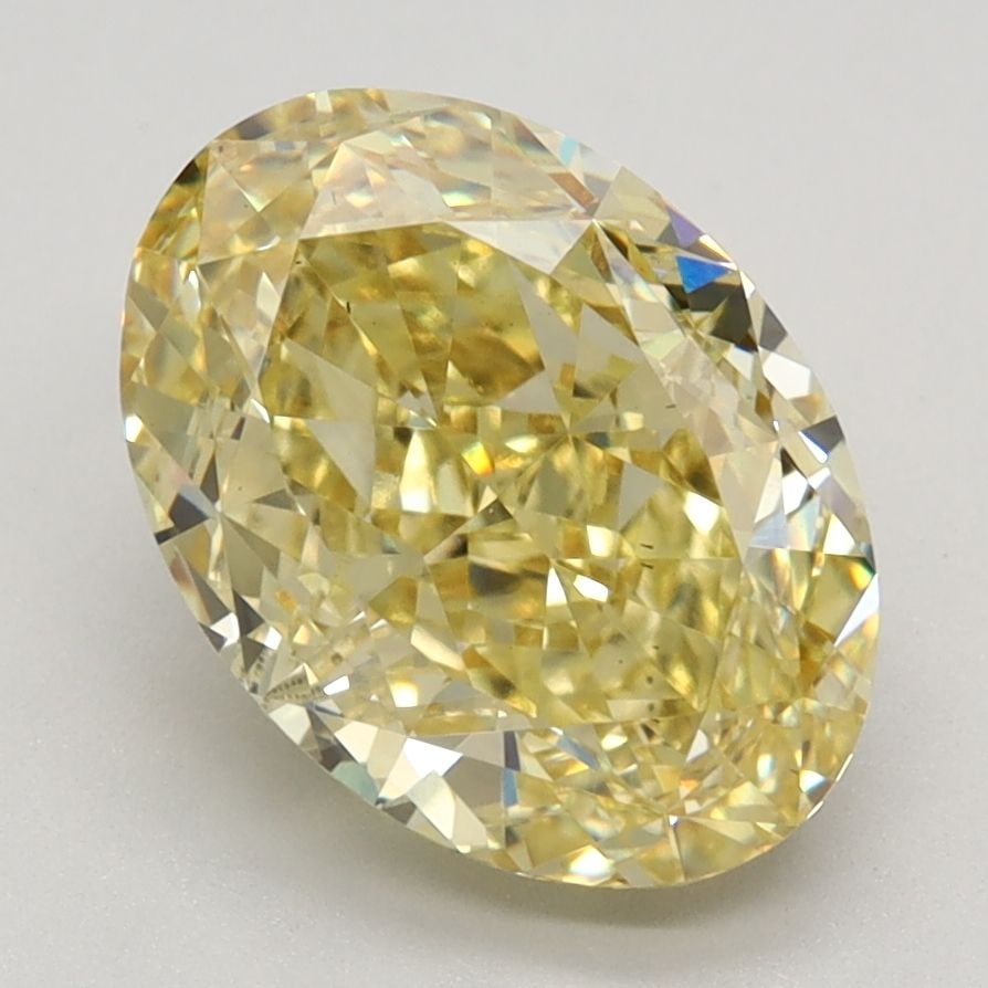 Loose Diamond - OVAL 3.08ct Fancy Vivid Yellow VS2: Loose Diamond - OVAL 3.08ct Fancy Vivid Yellow VS2 Source: This is a real non-mined Diamond that has been grown in a lab Shape: OVAL Carats: 3.08 Color: Fancy Vivid Yellow Certification: IGI Video: