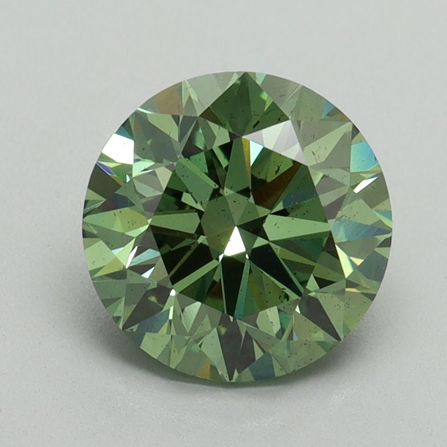 Loose Diamond - ROUND 2.07ct Fancy Vivid Green SI1: Loose Diamond - ROUND 2.07ct Fancy Vivid Green SI1 Source: This is a real non-mined Diamond that has been grown in a lab Shape: ROUND Carats: 2.07 Color: Fancy Vivid Green Certification: IGI Video:
