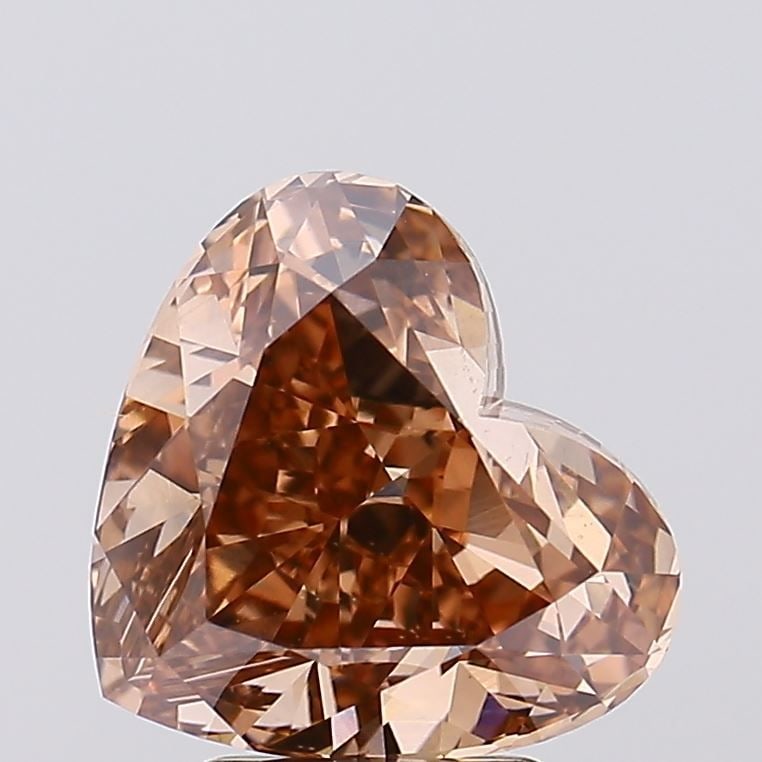 Loose Diamond - HEART 4.04ct Fancy Brown VS1: Loose Diamond - HEART 4.04ct Fancy Brown VS1 Source: This is a real non-mined Diamond that has been grown in a lab Shape: HEART Carats: 4.04 Color: Fancy Brown Certification: IGI Video: