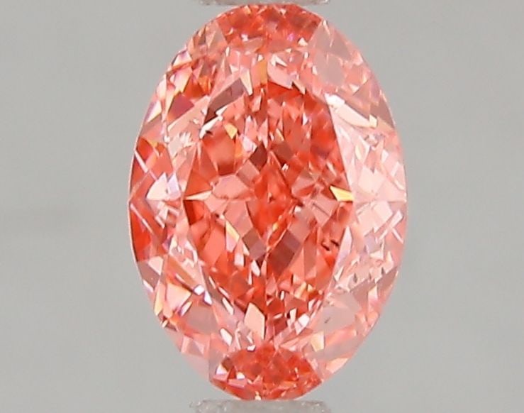 Loose Diamond - OVAL 1.05ct Fancy Vivid Pink VS2: Loose Diamond - OVAL 1.05ct Fancy Vivid Pink VS2 Source: This is a real non-mined Diamond that has been grown in a lab Shape: OVAL Carats: 1.05 Color: Fancy Vivid Pink Certification: IGI Video: