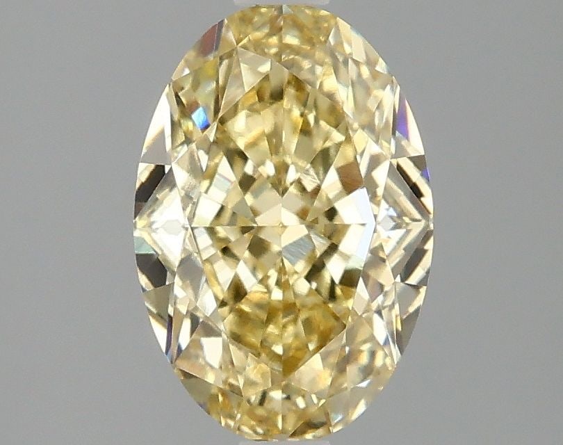 Loose Diamond - OVAL 2.09ct Fancy Intense Yellow VS1: Loose Diamond - OVAL 2.09ct Fancy Intense Yellow VS1 Source: This is a real non-mined Diamond that has been grown in a lab Shape: OVAL Carats: 2.09 Color: Fancy Intense Yellow Certification: IGI