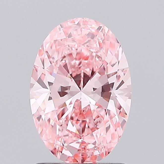 Loose Diamond - OVAL 1.4ct Fancy Vivid Pink VVS2: Loose Diamond - OVAL 1.4ct Fancy Vivid Pink VVS2 Source: This is a real non-mined Diamond that has been grown in a lab Shape: OVAL Carats: 1.4 Color: Fancy Vivid Pink Certification: IGI Video:
