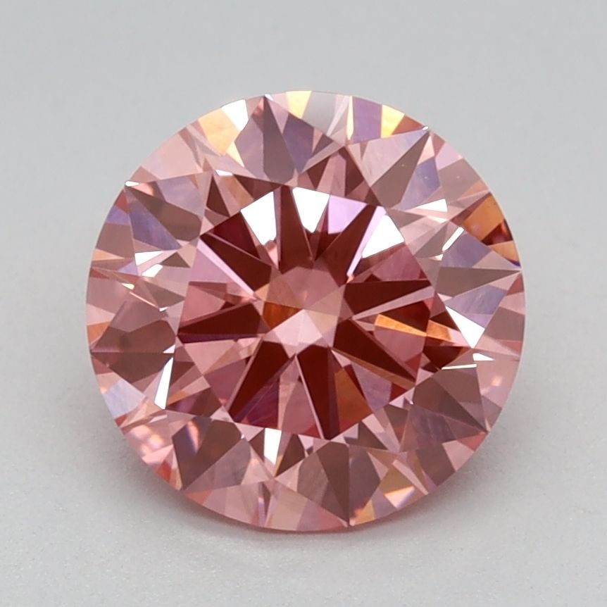 Ideal Loose Diamond - ROUND 1.56ct Fancy Vivid Pink VS2: Ideal Loose Diamond - ROUND 1.56ct Fancy Vivid Pink VS2 Source: This is a real non-mined Diamond that has been grown in a lab Shape: ROUND Carats: 1.56 Color: Fancy Vivid Pink Certification: IGI