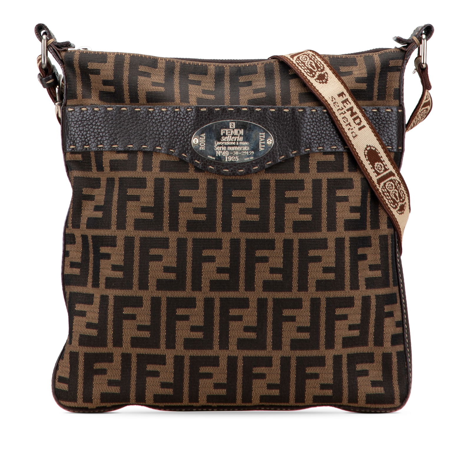 Fendi Zucca Canvas Selleria Crossbody Bag Brown Fabric Italy: Fendi Zucca Canvas Selleria Crossbody Bag Brown Fabric Italy Introducing the Fendi Zucca Canvas Selleria Crossbody, a stylish and functional accessory crafted in Italy. This crossbody bag is designed