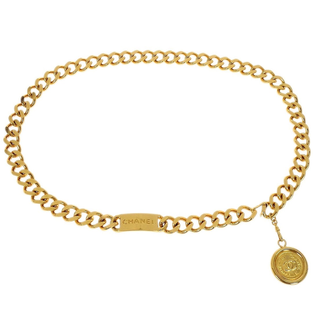 Gold-Plated Medallion Chain Belt by Chanel 94A Small: Gold-Plated Medallion Chain Belt by Chanel 94A Small This Chanel chain belt features a medallion design and is crafted from gold-plated material. The belt comes in a small size and showcases the iconi