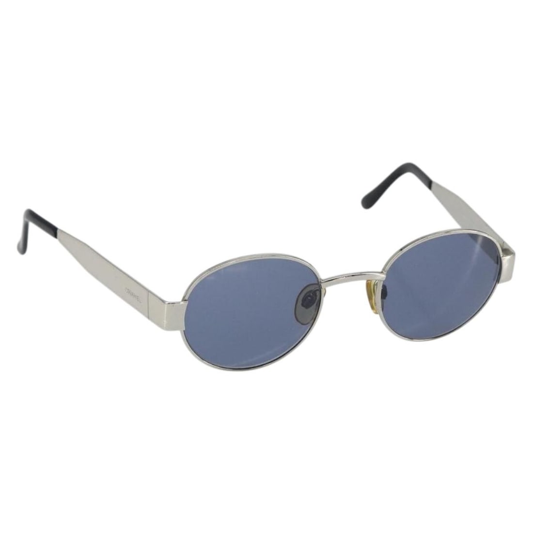 Black Metal CHANEL Sunglasses with CC Logo and Case: Black Metal CHANEL Sunglasses with CC Logo and Case These CHANEL sunglasses feature a sleek black metal frame and the iconic CC logo, offering a stylish accessory with Italian craftsmanship. The sungl