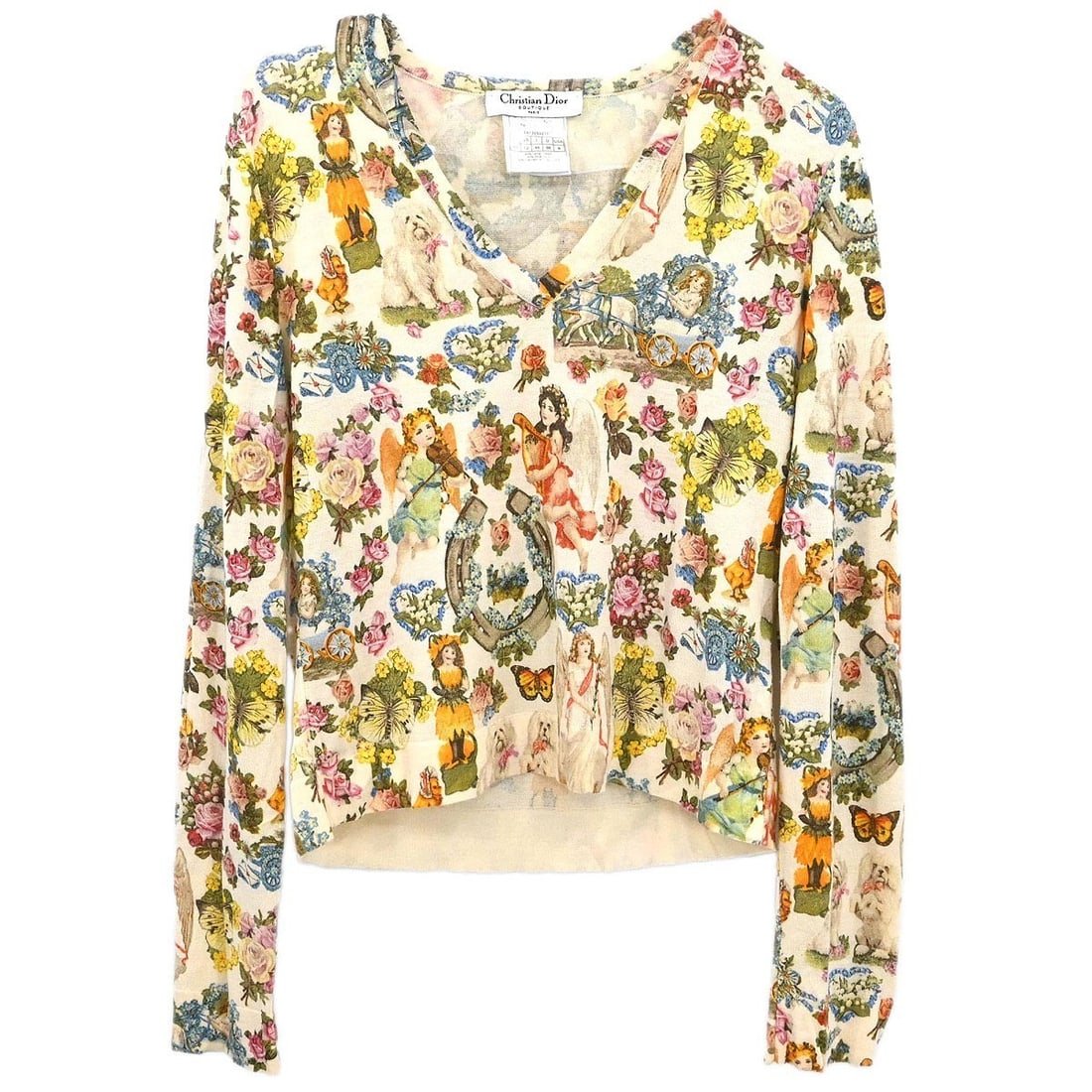 Dior Beige Wool Silk Cashmere V-Neck Long Sleeve Top Size 44: Dior Beige Wool Silk Cashmere V-Neck Long Sleeve Top Size 44 This Christian Dior top features a long sleeve design with a V-neckline, crafted from a luxurious blend of wool, silk, and cashmere. Design