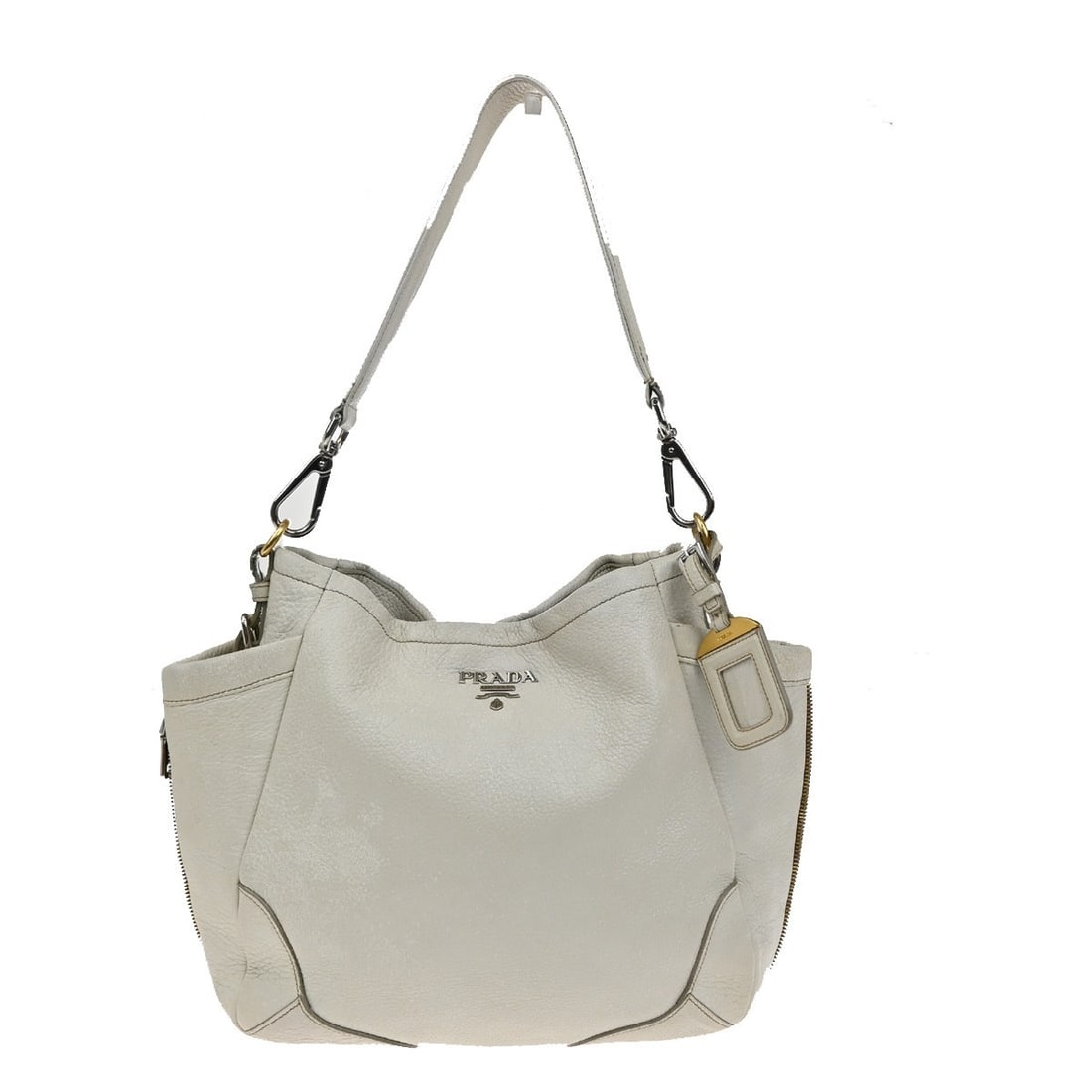 White Leather Side Pocket Zip Hobo by Prada Italy: White Leather Side Pocket Zip Hobo by Prada Italy This Prada Side Pocket Zip Hobo is crafted from white leather and designed for women. The bag features side pockets with zip closures and a spacious i