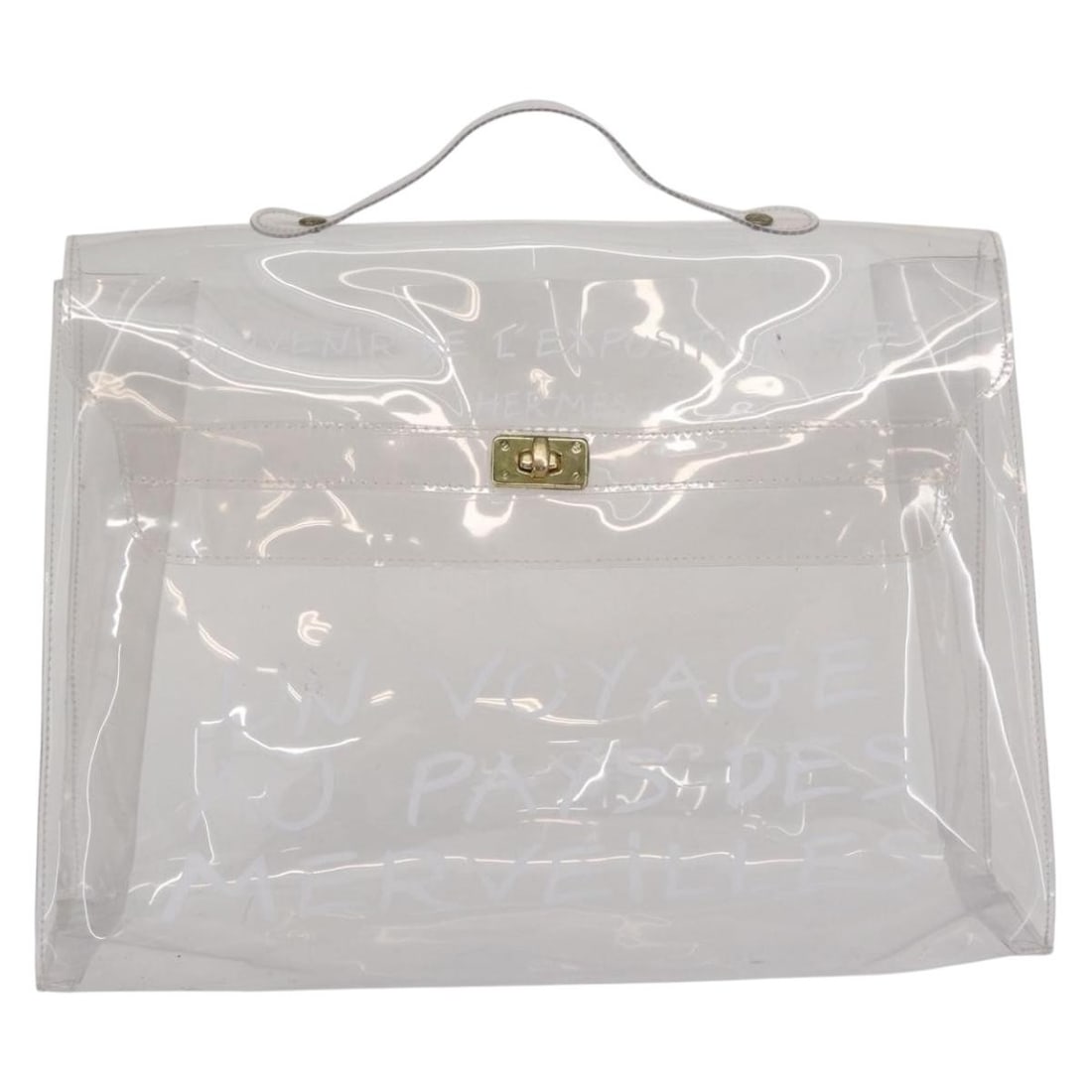 Clear Plastic Hermes Kelly Souvenir Bag 36cm: Clear Plastic Hermes Kelly Souvenir Bag 36cm This Hermes Kelly Souvenir Bag for women features a clear plastic body with metal fittings. The exterior shows signs of wear including surface deformation,