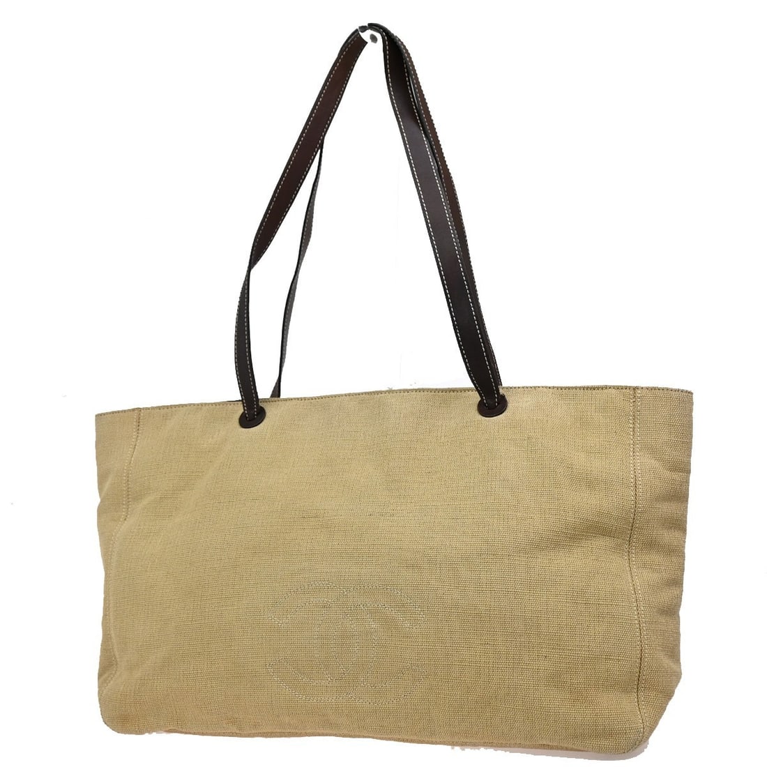 Vintage Chanel Beige Canvas and Leather Tote Bag 46cm by 30cm by 11cm: Vintage Chanel Beige Canvas and Leather Tote Bag 46cm by 30cm by 11cm This Chanel Vintage CC Tote is crafted from beige canvas with leather accents, designed for women. It features a spacious interior