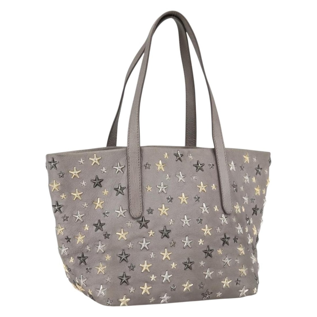 Gray and Gold Leather Tote with Star Studs by Jimmy Choo: Gray and Gold Leather Tote with Star Studs by Jimmy Choo This Jimmy Choo tote bag features a stylish gray leather exterior adorned with gold-tone star studs. Made in Italy, the bag offers a practical