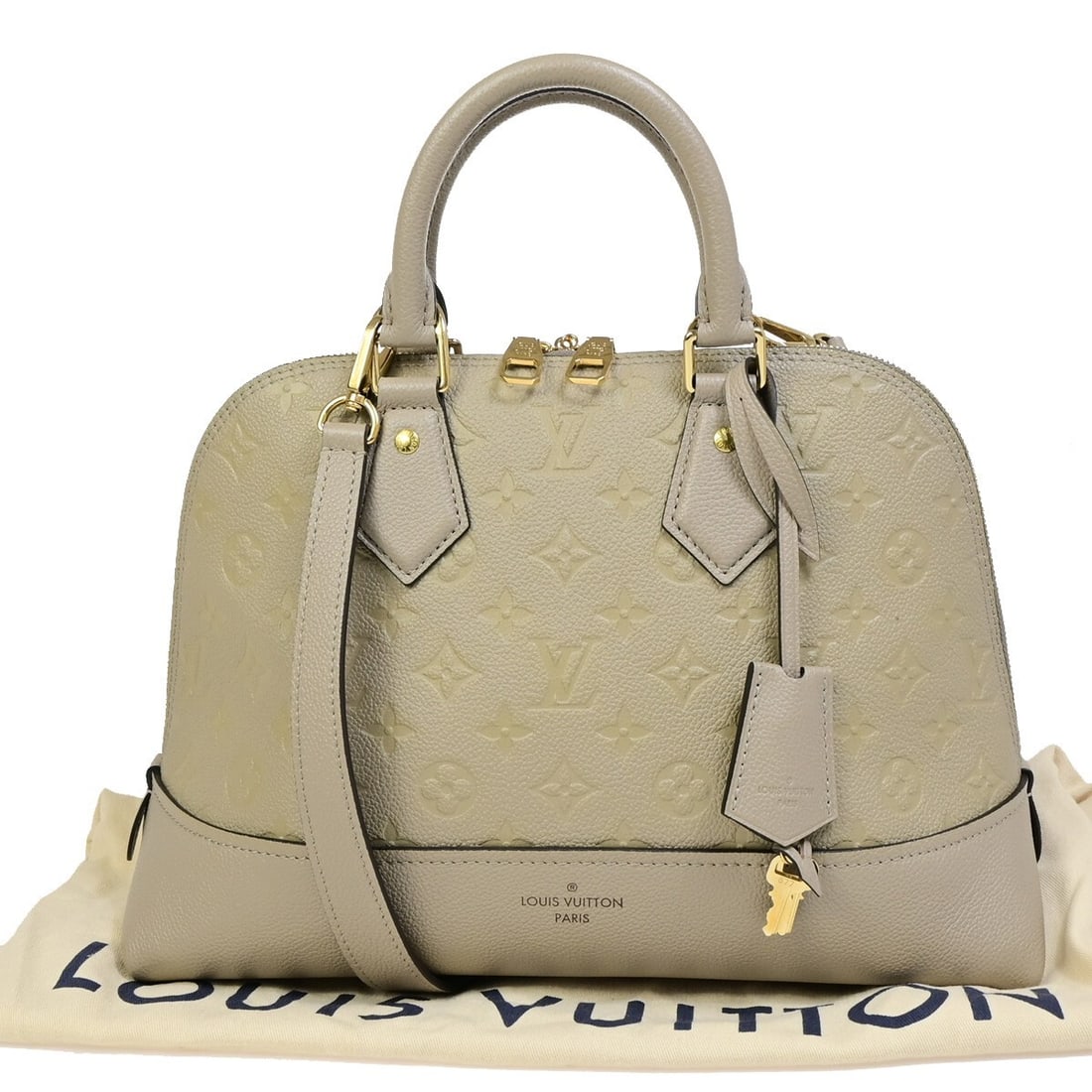 Louis Vuitton Neo Alma Beige Leather Handbag 32cm x 24cm x 14cm: Louis Vuitton Neo Alma Beige Leather Handbag 32cm x 24cm x 14cm This Louis Vuitton Neo Alma handbag for females is crafted from beige leather with the iconic Monogram Empreinte pattern. The handbag fe