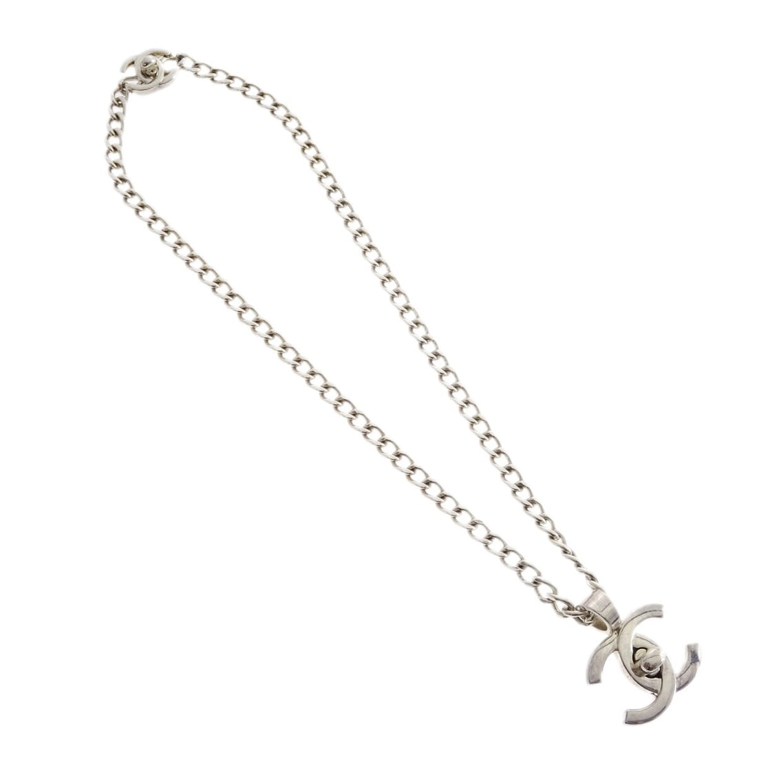 Chanel 96P Turnlock Silver Plated Chain Necklace 21 in: Chanel 96P Turnlock Silver Plated Chain Necklace 21 in This exquisite Chanel Turnlock Silver Chain Pendant Necklace from the 96P collection features a stylish chain design with a secure turnlock closu