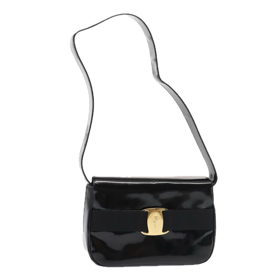 Black Patent Leather Vala Shoulder Bag by Salvatore Ferragamo: Black Patent Leather Vala Shoulder Bag by Salvatore Ferragamo This Salvatore Ferragamo Vala shoulder bag is crafted from black patent leather, designed for female use. It features a shoulder strap and