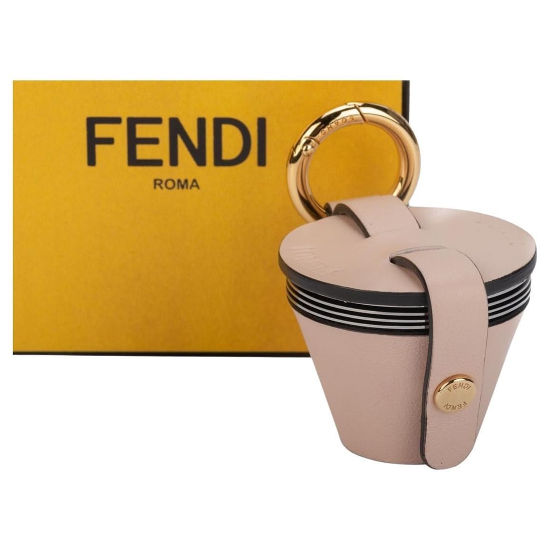 Fendi Powder Pink Shot Holder Set with 4 Steel Glasses: Fendi Powder Pink Shot Holder Set with 4 Steel Glasses Introducing the exquisite Fendi Shot Holder Set, a luxurious addition to your collection. This stunning piece features a powder pink shot holder