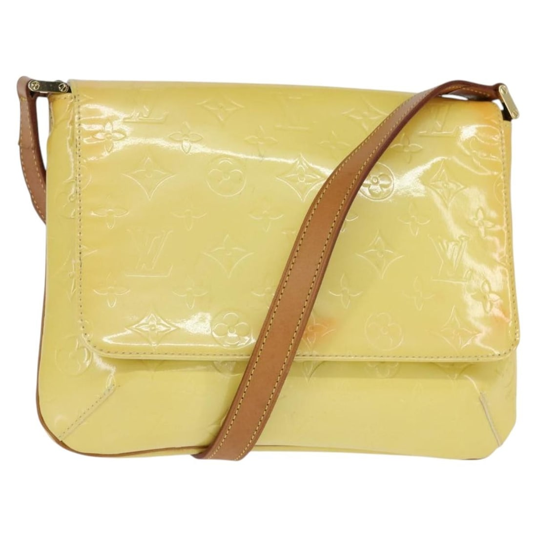 Thompson Street Yellow Patent Leather Shoulder Bag by Louis Vuitton: Thompson Street Yellow Patent Leather Shoulder Bag by Louis Vuitton The Louis Vuitton Thompson Street Handbag in Monogram Vernis features a lime yellow patent leather exterior. Designed for women, thi
