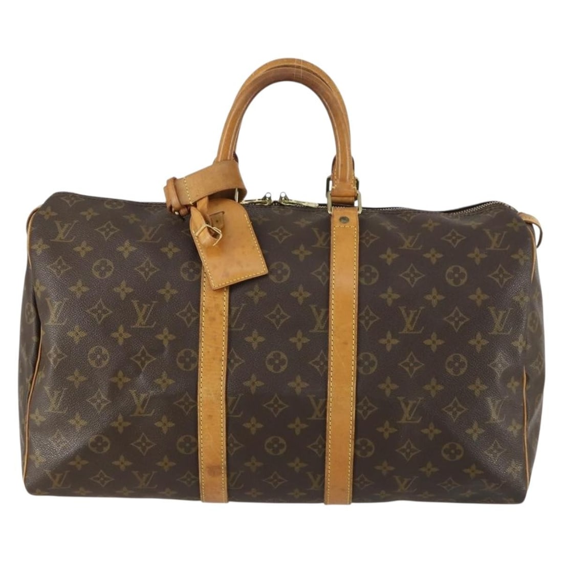 Monogram Canvas Louis Vuitton Keepall Travel Bag 45cm: Monogram Canvas Louis Vuitton Keepall Travel Bag 45cm This Louis Vuitton Keepall Bag features the iconic monogram canvas and is designed for unisex use. It has a brown canvas exterior with leather han