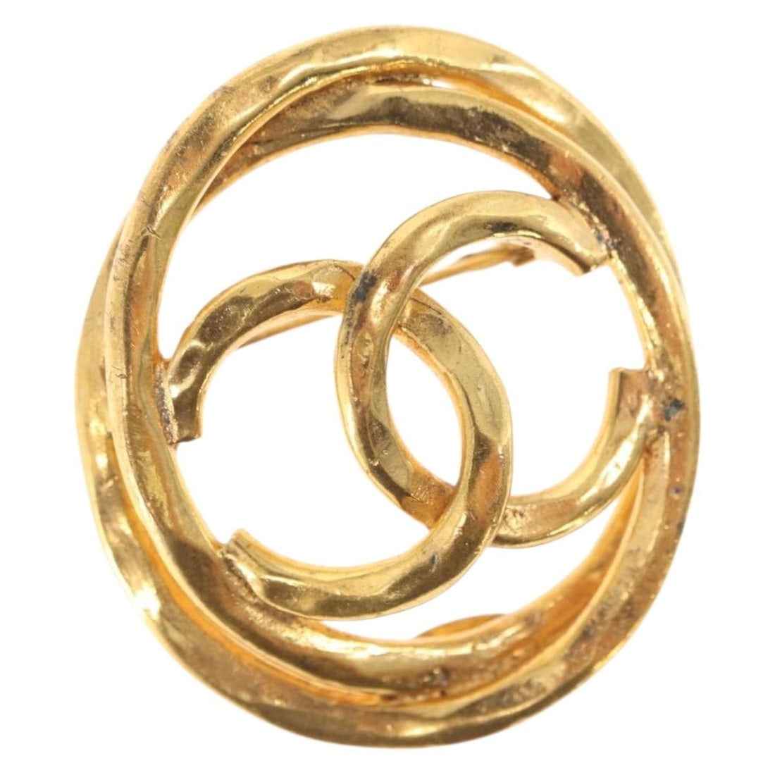 Gold Tone Metal Brooch by Chanel Coco Mark CC France: Gold Tone Metal Brooch by Chanel Coco Mark CC France This is an authentic CHANEL brooch featuring the iconic Coco Mark double CC design. Crafted from gold-tone metal, the brooch showcases a stylish an