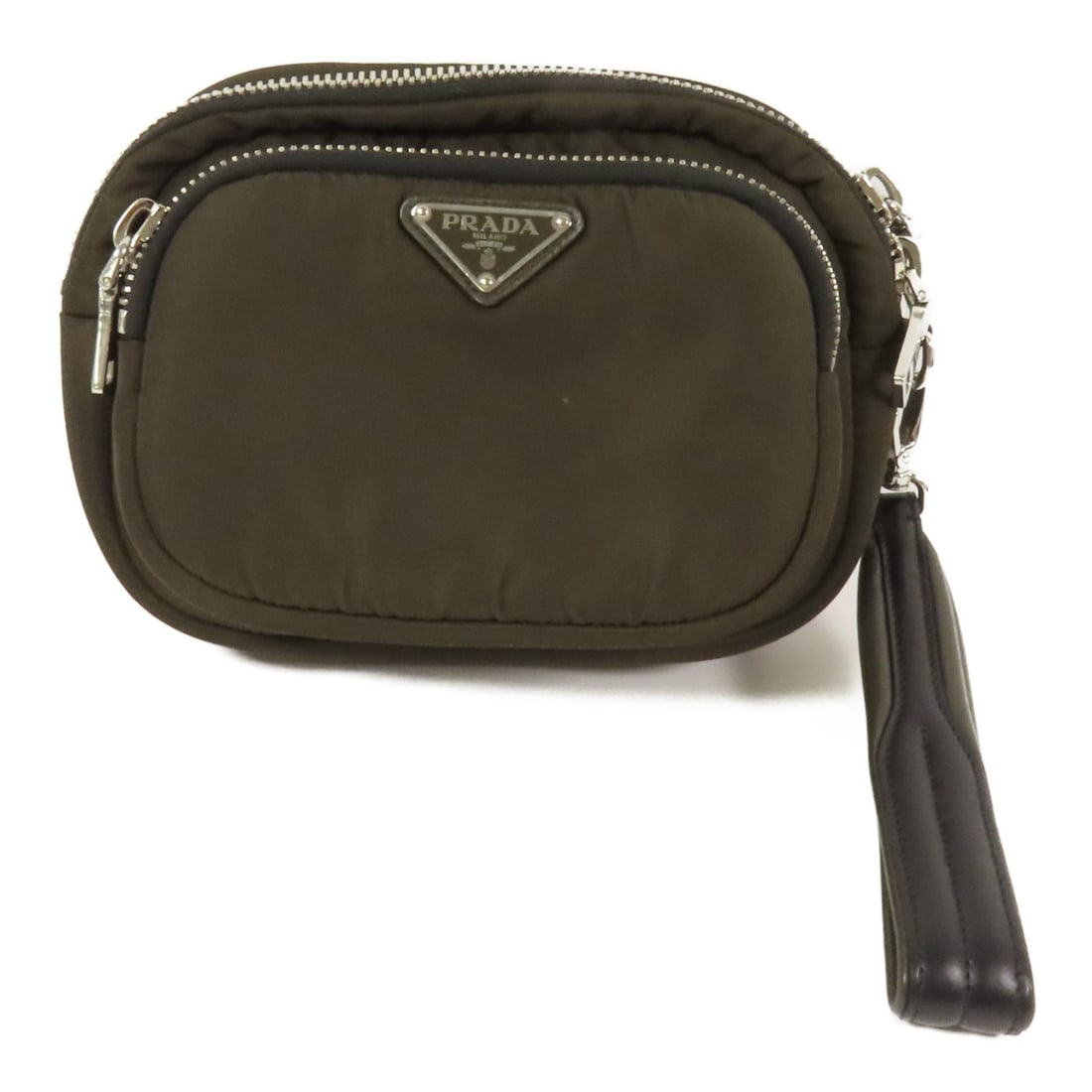 Green Nylon Clutch Pouch by Prada with Silver Tone Hardware: Green Nylon Clutch Pouch by Prada with Silver Tone Hardware This Prada clutch bag is crafted from green nylon and features a structured pouch design. Made in Italy, it showcases a silver-tone hardware