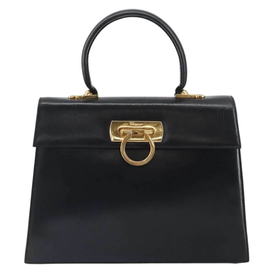 Black Leather Salvatore Ferragamo Women's Convertible Top Handle Purse: Black Leather Salvatore Ferragamo Women's Convertible Top Handle Purse This Salvatore Ferragamo convertible top handle bag is crafted from black leather, designed for female use. It features a versati