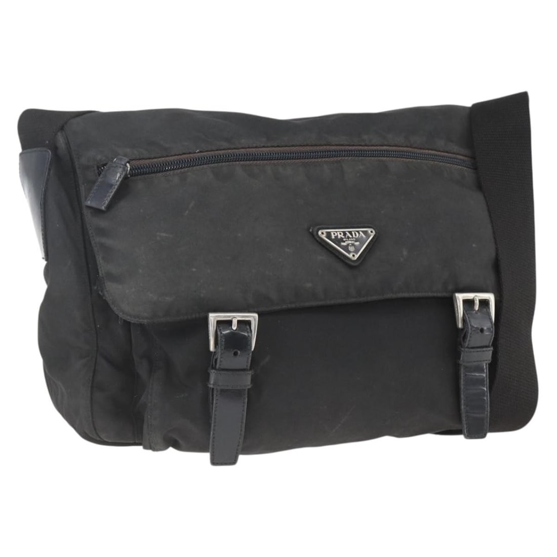 Prada Black Nylon Shoulder Bag with Silver Accents Italy: Prada Black Nylon Shoulder Bag with Silver Accents Italy This PRADA shoulder bag features a black and silver nylon exterior and is crafted in Italy. The bag offers a spacious interior and an adjustabl