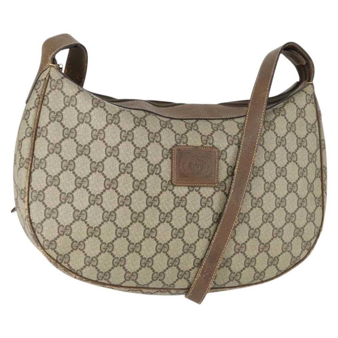 Beige Gold GG Supreme Canvas Shoulder Bag by Gucci with 001 256 0719 Code: Beige Gold GG Supreme Canvas Shoulder Bag by Gucci with 001 256 0719 Code This authentic GUCCI GG Supreme shoulder bag features the classic beige and gold GG canvas. The bag is designed with a structu