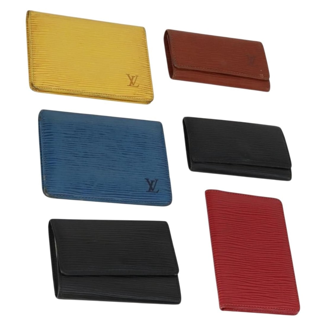 Set of 6 Louis Vuitton Epi Leather Multicolor Key Cases: Set of 6 Louis Vuitton Epi Leather Multicolor Key Cases This Louis Vuitton Epi leather key case set features a combination of black, blue, and yellow colors. Crafted in France, the set includes six ke
