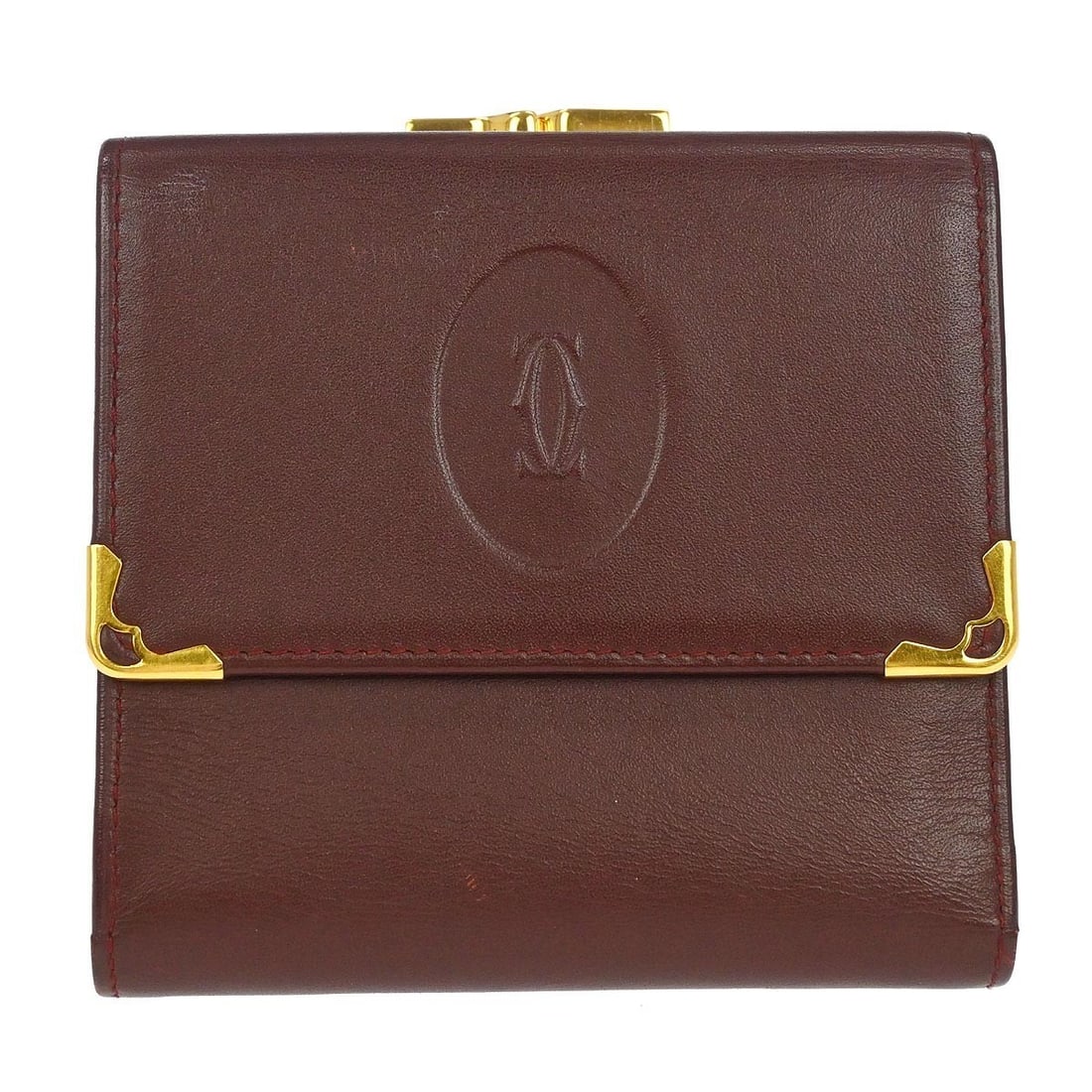 Bordeaux Leather Must de Cartier Vintage Bifold Wallet: Bordeaux Leather Must de Cartier Vintage Bifold Wallet This Cartier Must de Cartier bifold wallet features a Bordeaux color in high-quality leather. With a classic wristlet style, it is a vintage piec