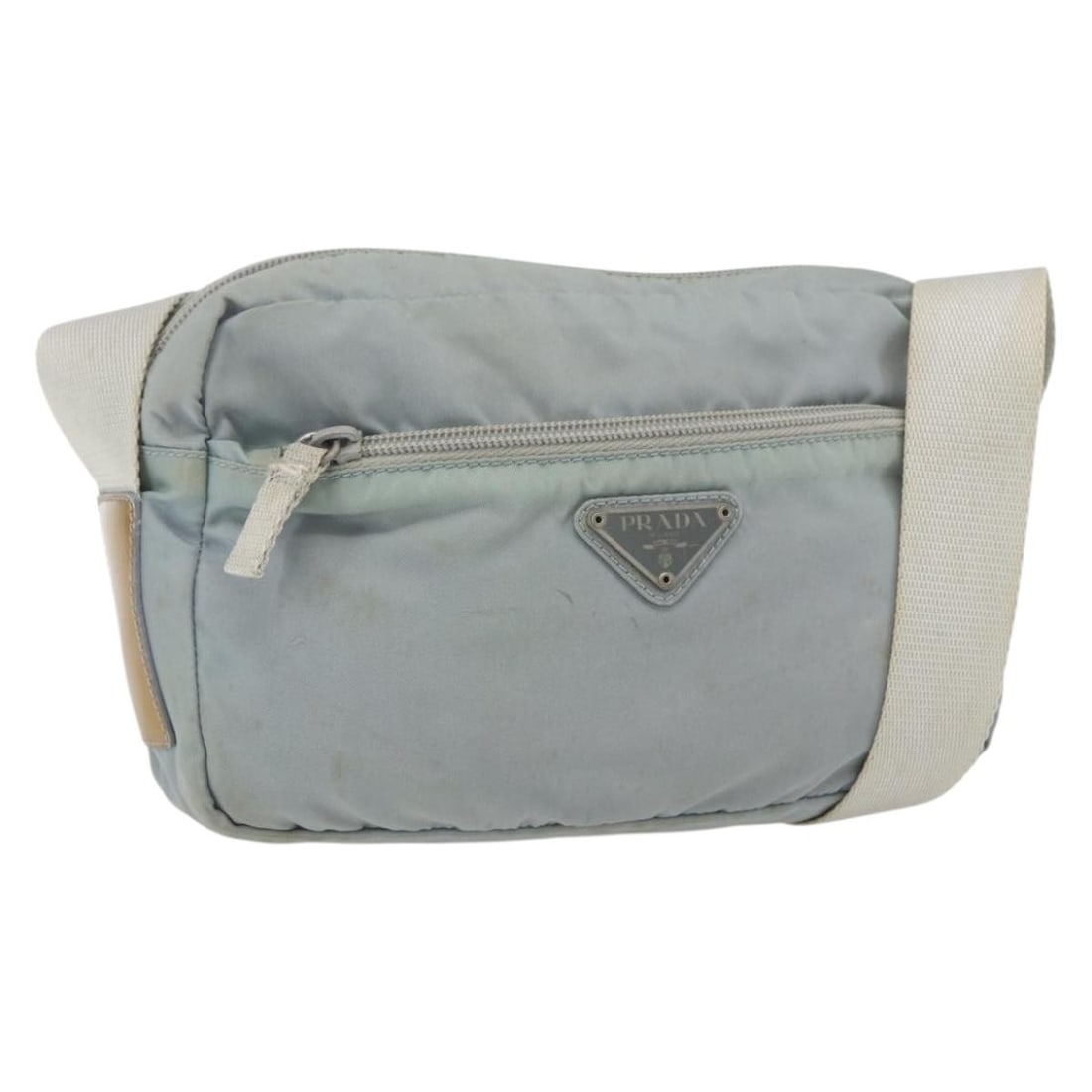 Light Blue Nylon PRADA Shoulder Bag with Silver Tone Details: Light Blue Nylon PRADA Shoulder Bag with Silver Tone Details This PRADA shoulder bag features a light blue and silver nylon exterior with silver-tone hardware. Designed for practicality and style, the