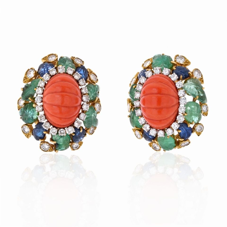 David Webb Coral Emerald Sapphire Diamond Earrings Platinum Gold: David Webb Coral Emerald Sapphire Diamond Earrings Platinum Gold Discover the stunning elegance of these David Webb earrings, featuring vibrant fluted coral in a bright salmon hue. Each ear clip is be
