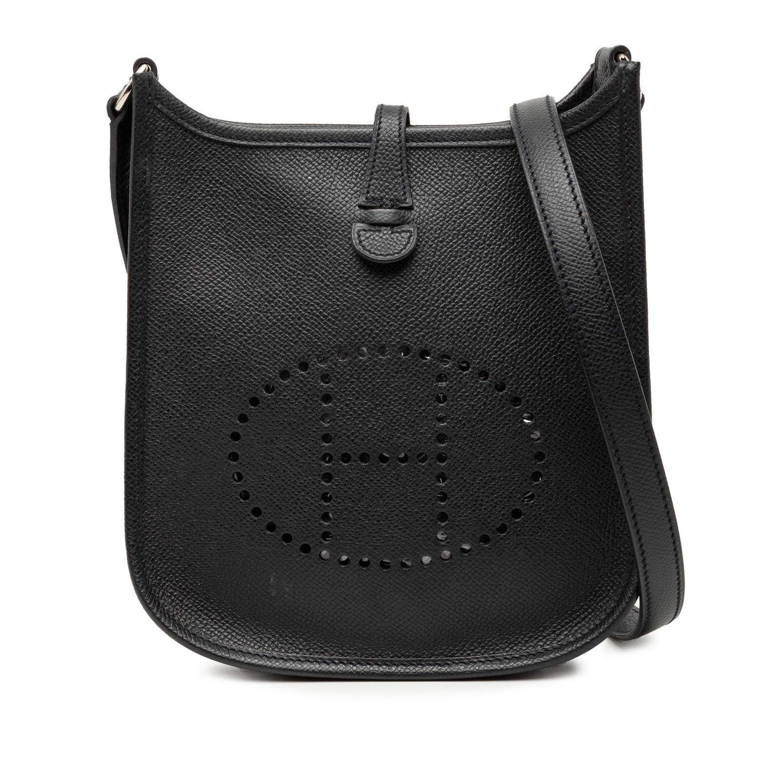 Black Epsom Leather Hermes Evelyne 16 Bag With Canvas Strap: Black Epsom Leather Hermes Evelyne 16 Bag With Canvas Strap The Hermes Epsom Evelyne 16 features a Noir Epsom leather body, a detachable flat canvas strap, and an open top with a tuck closure. This ba
