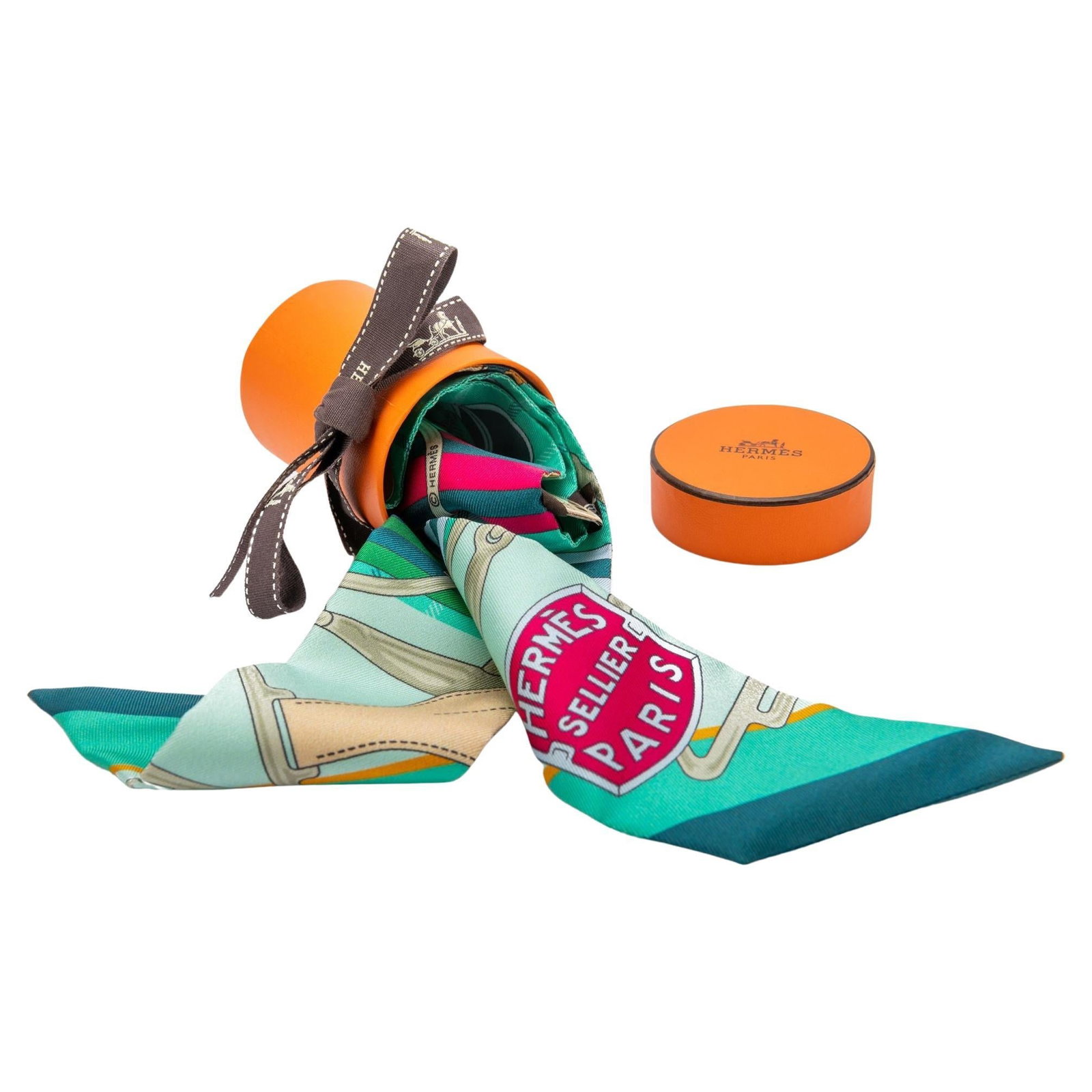 Hermes Green Silk Sellier Twilly Scarf NIB with Box: Hermes Green Silk Sellier Twilly Scarf NIB with Box Discover the exquisite Hermes Sellier Twilly Scarf, a stunning accessory crafted from luxurious silk. This brand new scarf features a vibrant multic