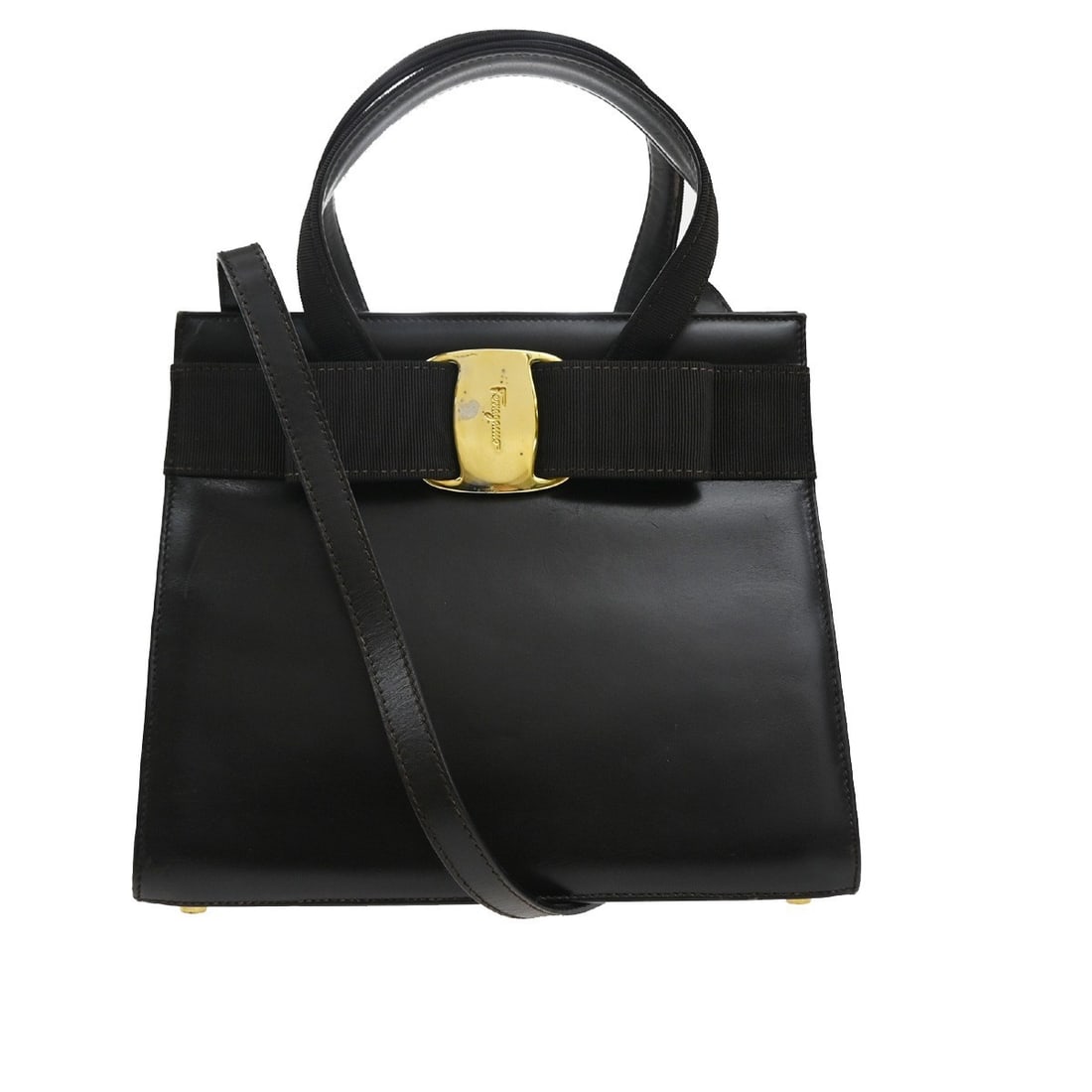 Brown Leather Tote with Vara Bow by Salvatore Ferragamo: Brown Leather Tote with Vara Bow by Salvatore Ferragamo This pre-owned Salvatore Ferragamo Convertible Vara Bow Tote is crafted from brown leather and designed for women. The tote features a signature