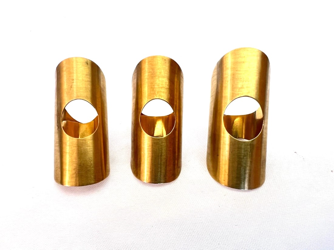 3 Piece Adjustable 18K Yellow Gold Rings Set by Graziella Laffi: 3 Piece Adjustable 18K Yellow Gold Rings Set by Graziella Laffi Elevate your jewelry collection with this stunning set of three adjustable rings from Graziella Laffi, crafted in luxurious 18K yellow g