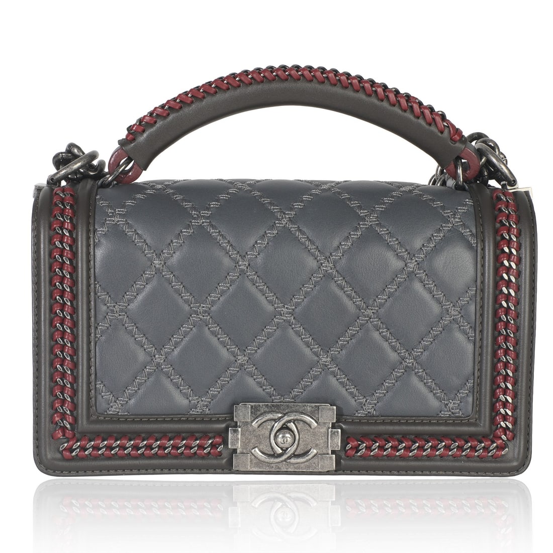Boy Bag Grey Quilted Calfskin Chain Top Handle Shoulder Bag by Chanel: Boy Bag Grey Quilted Calfskin Chain Top Handle Shoulder Bag by Chanel This Chanel Grey Quilted Calfskin Interwoven Chain Top Handle Boy Bag features a sophisticated quilted leather exterior in gray, c