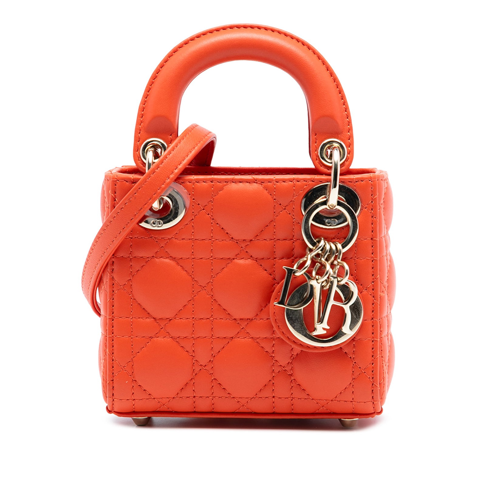 Dior Lady Dior Micro Bag Orange Quilted Lambskin with Shoulder Strap: Dior Lady Dior Micro Bag Orange Quilted Lambskin with Shoulder Strap This Micro Lady Dior bag showcases a quilted lambskin leather body in orange, complemented by flat leather top handles and a detach