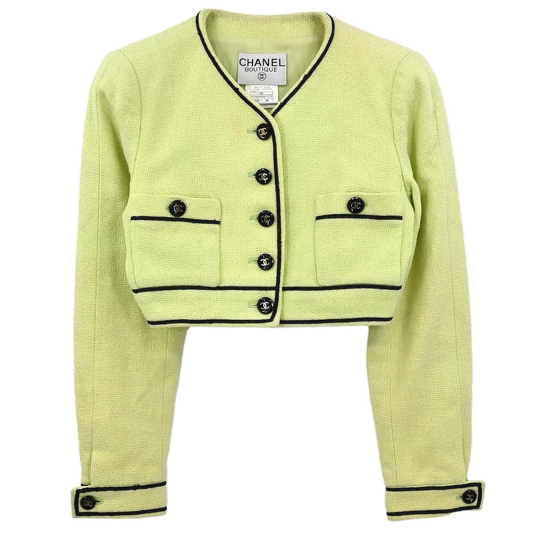 Chanel Light Green Vintage Cotton Collarless Single Breasted Jacket Size 36: Chanel Light Green Vintage Cotton Collarless Single Breasted Jacket Size 36 This Chanel single-breasted, collarless jacket features a light green hue and is crafted from 100% cotton. Designed with lon