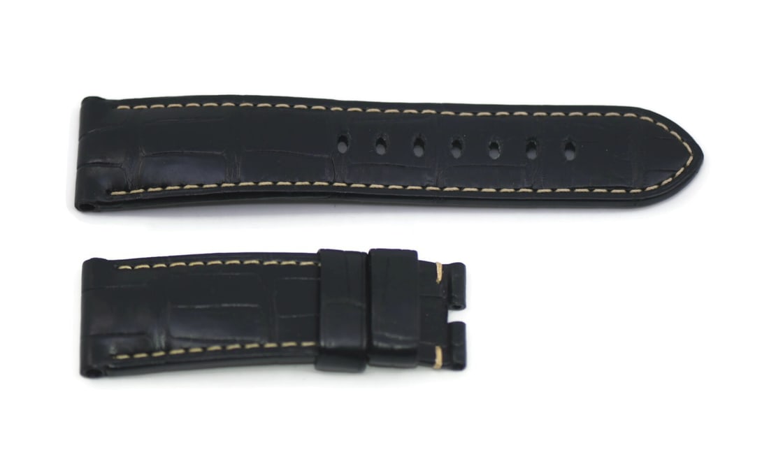 Authentic Panerai Black Leather Wristwatch Strap 24mm: Authentic Panerai Black Leather Wristwatch Strap 24mm Upgrade your watch with this authentic Panerai Black Leather Strap. Crafted from high-quality leather, this wristwatch band features a sleek black