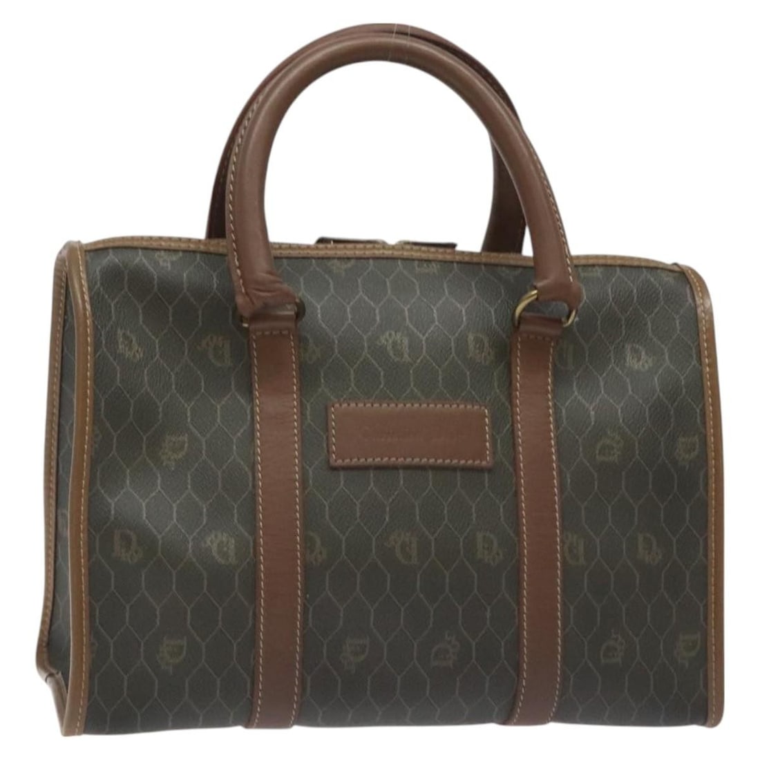 Black Canvas Honeycomb Bag by Christian Dior with Leather Accents: Black Canvas Honeycomb Bag by Christian Dior with Leather Accents This Christian Dior vintage Honeycomb handbag features a black canvas exterior with leather accents. Designed for women, it showcases