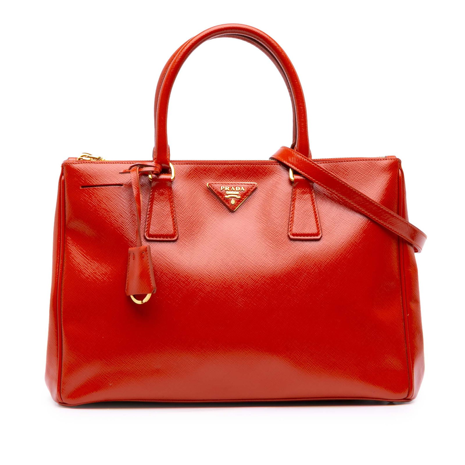 Prada Red Medium Saffiano Vernice Galleria Double Zip Satchel: Prada Red Medium Saffiano Vernice Galleria Double Zip Satchel This Prada Medium Saffiano Vernice Galleria Double Zip Satchel showcases a luxurious saffiano leather body in a striking red color. It fea