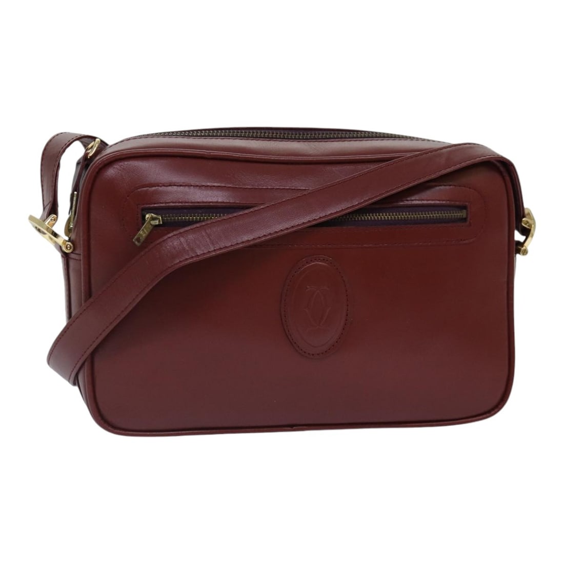 CARTIER Must Line Bordeaux Leather Shoulder Bag Gold Accents: CARTIER Must Line Bordeaux Leather Shoulder Bag Gold Accents Introducing the CARTIER Must Line Shoulder Bag, a luxurious accessory crafted from high-quality leather in a stunning Bordeaux and Gold col