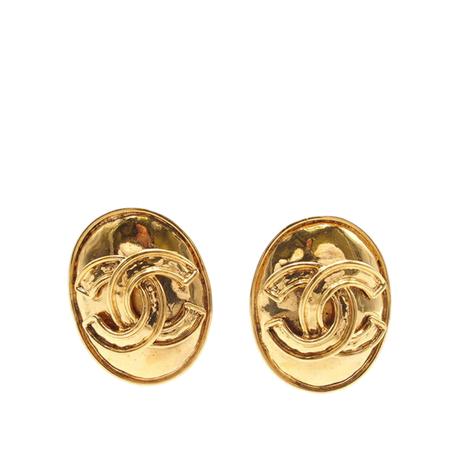 Chanel CC Oval Clip On Earrings in Gold Plated Metal: Chanel CC Oval Clip On Earrings in Gold Plated Metal These Chanel earrings feature an oval-shaped design with gold plated metal and a clip-on closure. They showcase the iconic CC logo and are crafted