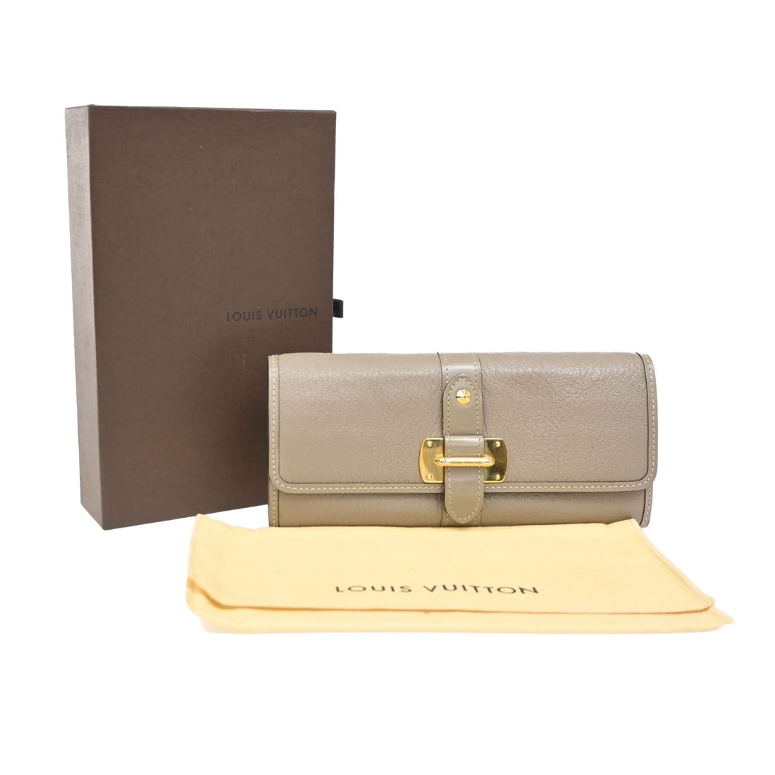 Suhali Le Favori Gray Leather Wallet by Louis Vuitton: Suhali Le Favori Gray Leather Wallet by Louis Vuitton The Louis Vuitton Suhali Le Favori Wallet is crafted from gray leather and designed for women. This wallet features a spacious interior and classi