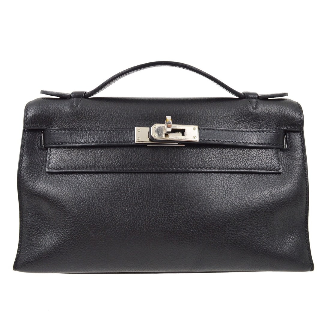 Black Evergrain Kelly Pochette Top Handle Bag by Hermes: Black Evergrain Kelly Pochette Top Handle Bag by Hermes This Hermes Kelly Pochette is crafted from black Evergrain leather and features a top handle and turn lock closure. It has a compact, small size