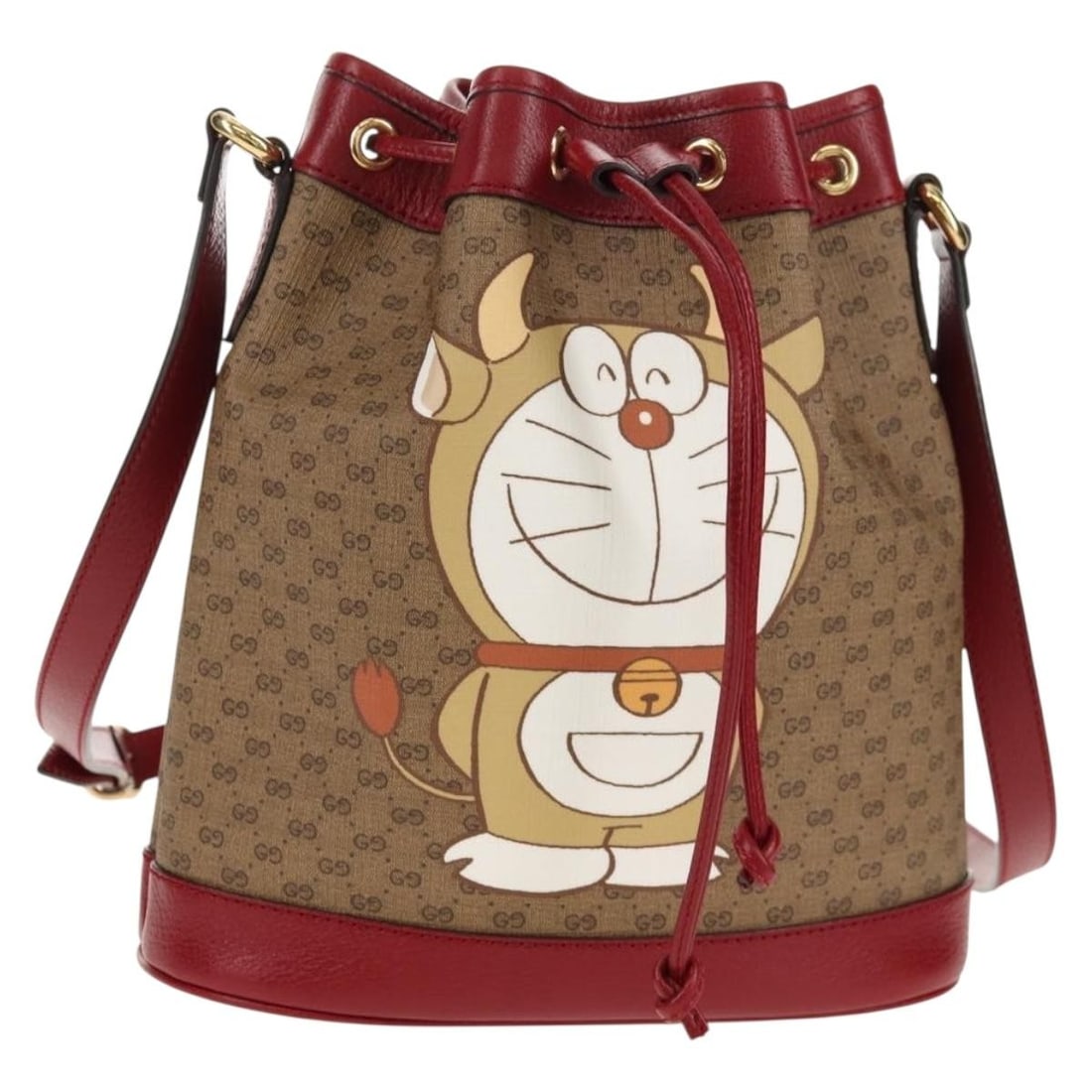 Gucci Doraemon Mini Bucket Bag Beige PVC GG Supreme Print: Gucci Doraemon Mini Bucket Bag Beige PVC GG Supreme Print This pre-owned Gucci Doraemon Bucket Bag features the signature Mini GG Supreme coated canvas with a playful Doraemon print. Designed for wome
