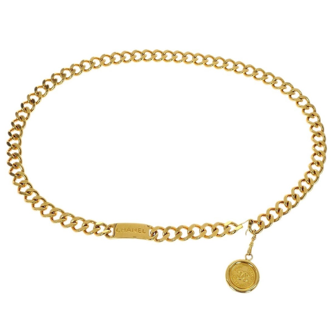 Gold Plated Chain Belt with Medallion by Chanel One Size: Gold Plated Chain Belt with Medallion by Chanel One Size This is a Chanel chain belt featuring a medallion design. The belt is crafted from gold-plated material and comes in a gold color. It is design